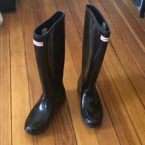 Black shiny rain boots